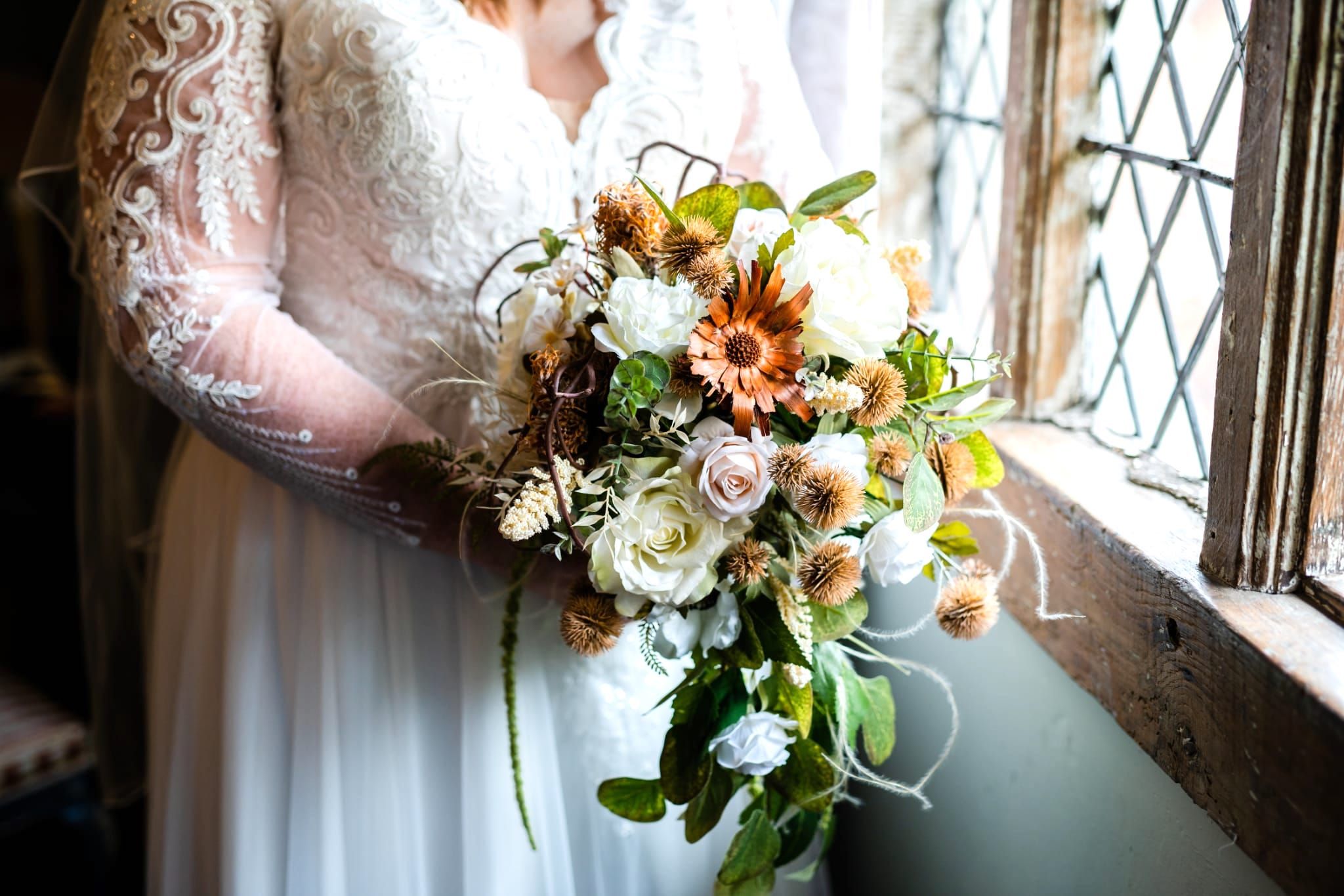 Cascading Dried and artificial bouquet with Proteas, Roses and Astilbes