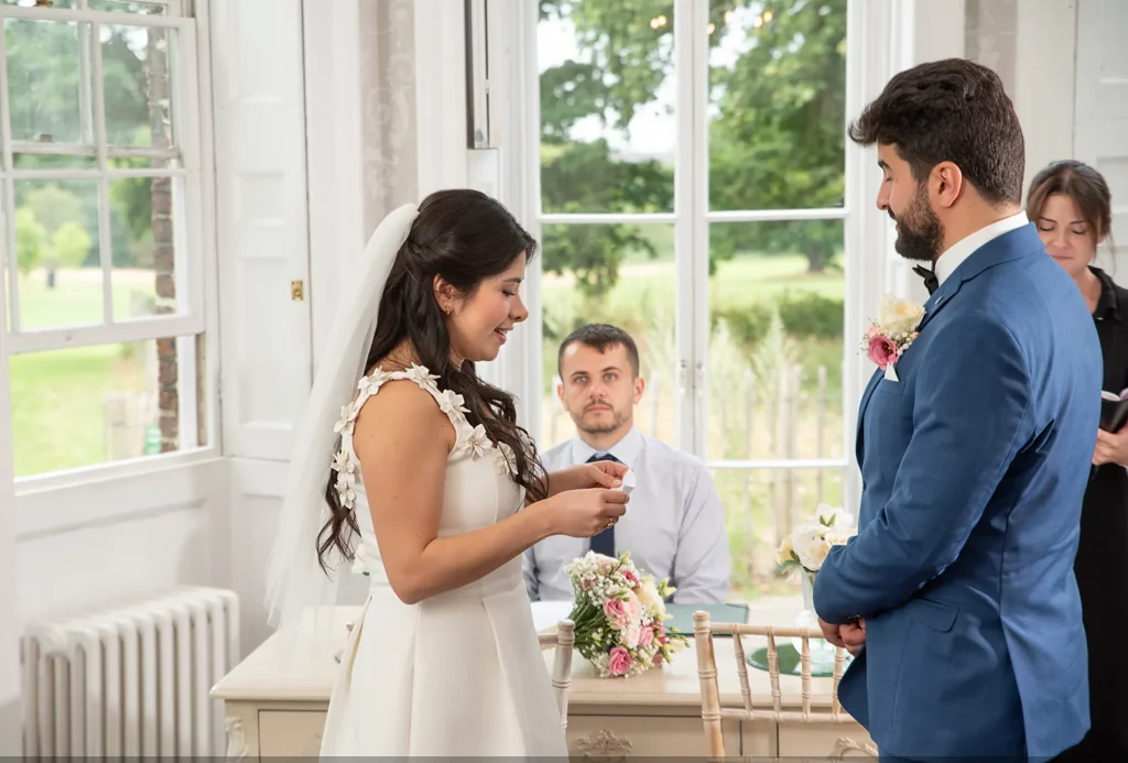 Elegant micro wedding ceremony with intimate celebration, beautiful floral styling, and couple surrounded by close family and friends.