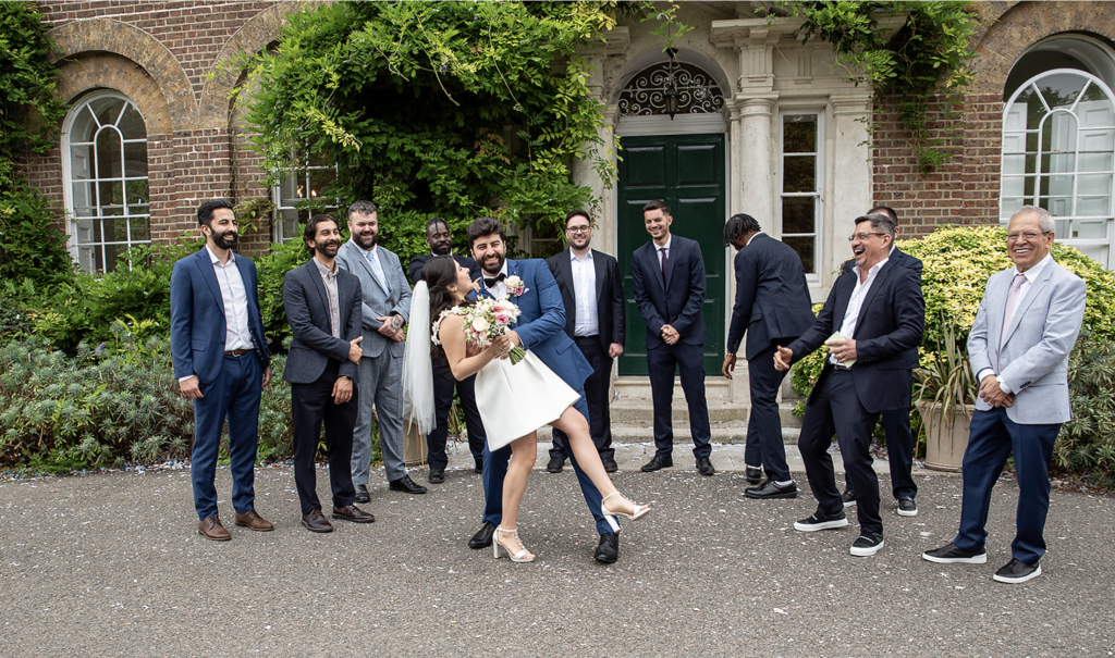 a happy bride and groom with their guests